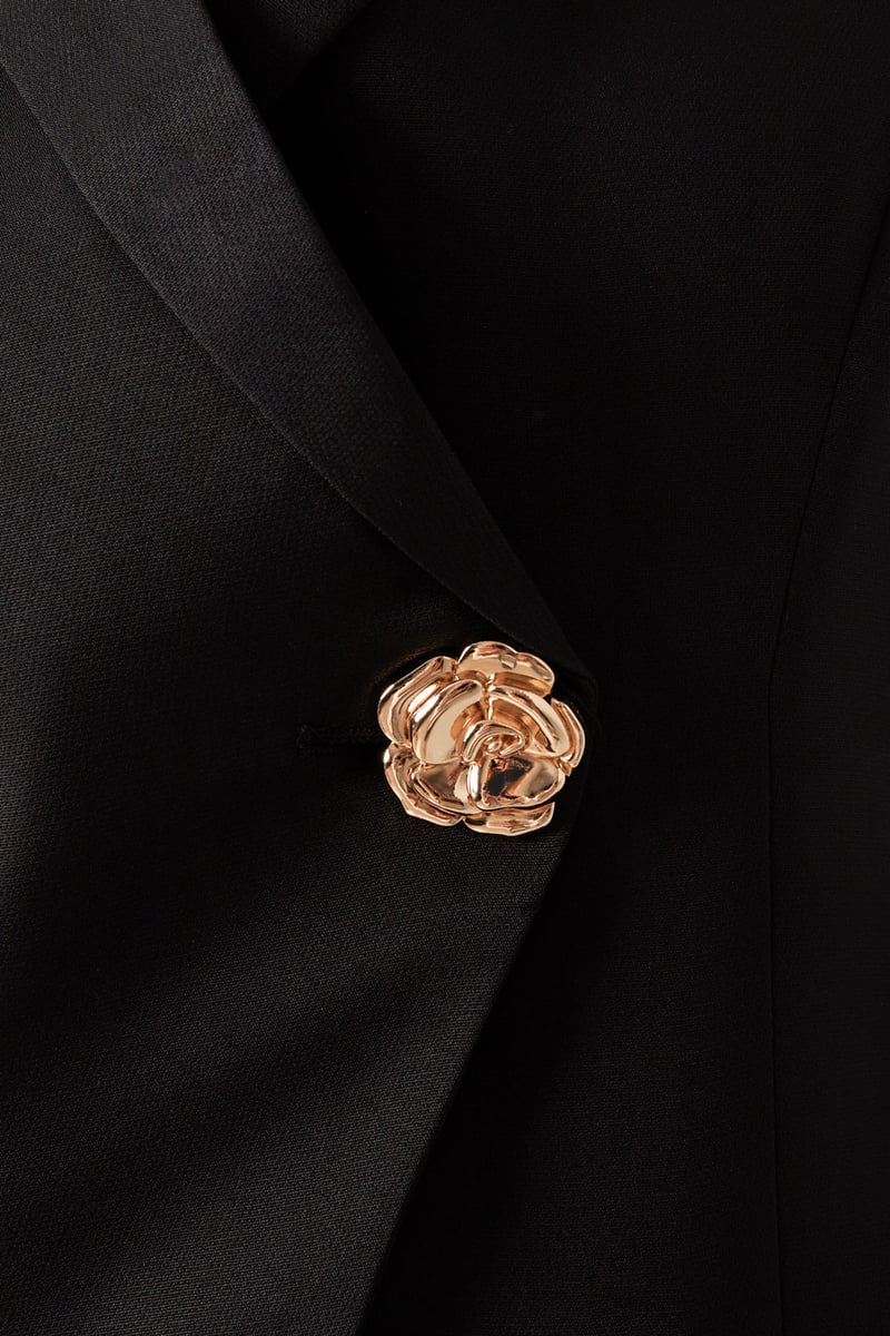 De mouwloze blazer